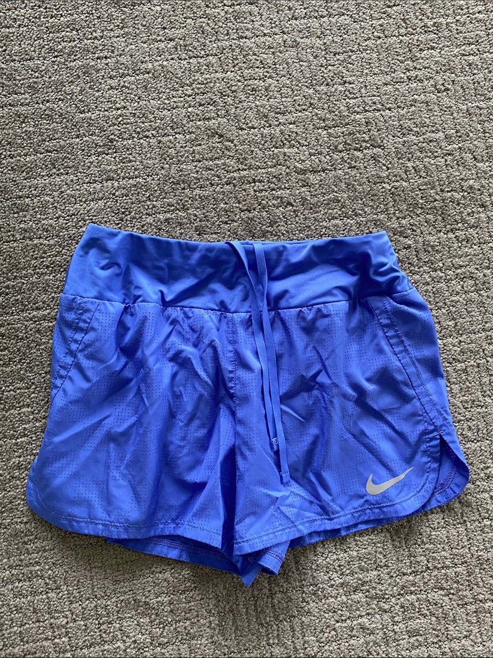 Nike Women's Periwinkle Blue Athletic Shorts with Silver Swoosh